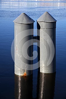 The Neva river in Saint-Petersburg, Russia. Bollards. Construction to tire ships