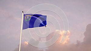 Nevada flag fluttering with sky background. 4k 3d render