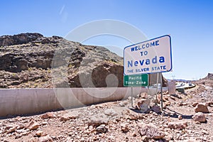 Nevada sign at the road in border area.