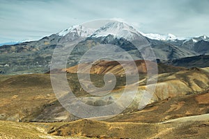 Nevado de Putre and colorful mountain views from Cerro Milagro