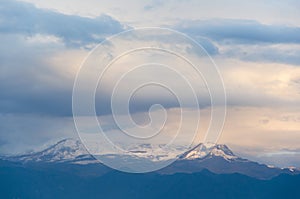 Nevado del Ruiz, a Colombian snow-covered volcano, under a cloudy sky photo