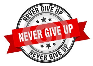 never give up label. never give up round band sign.