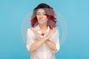 Never, no compromise! Portrait of dissatisfied hipster woman with fancy red hair crossing hands, showing x sign