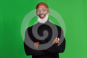 Never stop believing in yourself. Studio shot of a senior man posing against a green background.