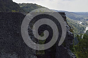 Nevitsky castle ruins flaunt on a high hill with an impressive view from above on a tree in Transcarpathia, Ukraine...