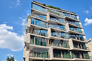 New apartment building with floor-to-ceiling windows