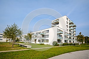 New apartment building - modern residential development in green urban settlement