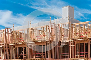 New apartment building under construction with multilevel parking garage near Dallas