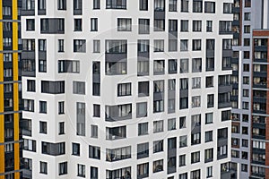 New apartment buildings with windows and balconies. Modern european complex