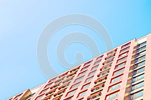 New apartment building on a blue sky background