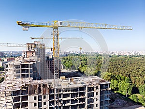 New apartments building under construction against blue sky