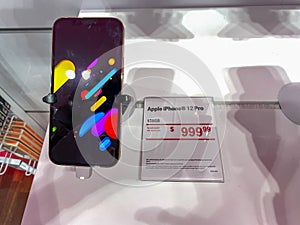 The new Apple iPhone 12 and 12 Pro on display at the T Mobile store