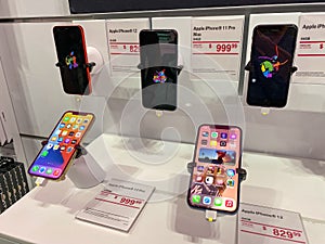 The new Apple iPhone 12 and 12 Pro on display at the T Mobile store