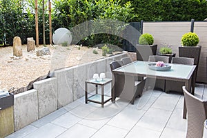 New arranged stone garden with terrace and Table and chairs