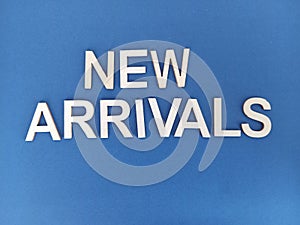 New arrivals sign on a blue background