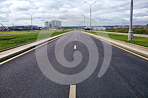 New asphalt with the marking of the newly built road