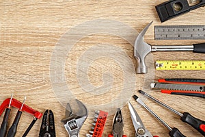 New of assorted work tools on wood with copy space for text