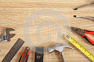 New of assorted work tools on wood with copy space for text