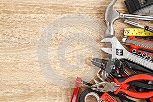 New of assorted work tools on wood with copy space for text
