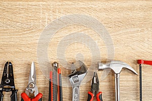 New of assorted work tools on wood with copy space for text