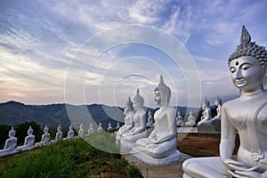 New attraction. buddha statues on the mountain at Phu Phra Ban Mak Khaeng, Dan Sai, Loei, Thailand photo