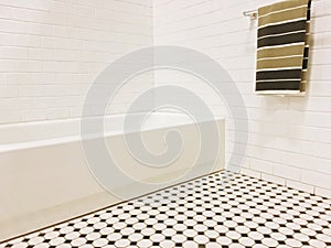 New bathroom with black and white ceramic tile decor
