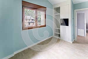 New beautiful empty bedroom with large window. Interior modern room