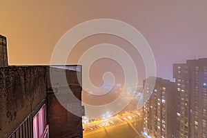 New Belgrade covered with fog photographed from a tall building