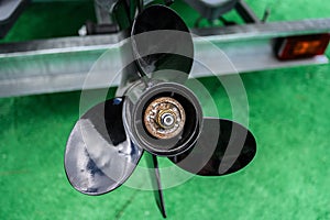 New black propeller for the yacht`s motor. Close up. Tenerife, Canary Islands, Spain
