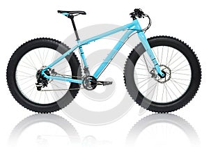 New blue bicycle with thick tires for snow ride isolated on a white