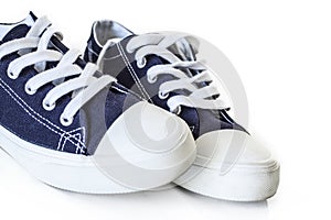 New blue sneakers on white background