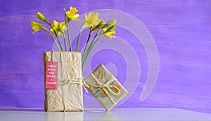 New book releases for spring 2023, gift wrapped books, hang tag and flowers.Spring Book fair, inspiration,reading, education,