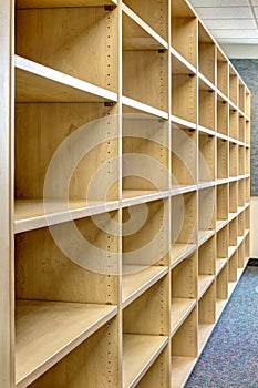 Empty library shelves in a new library.