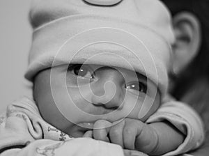 New born asian baby girl on her mother's shoulder