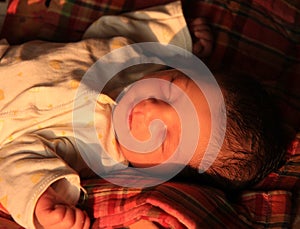 New born asian baby girl in sun light