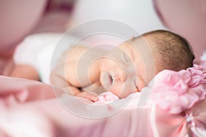 New born baby asleep photo