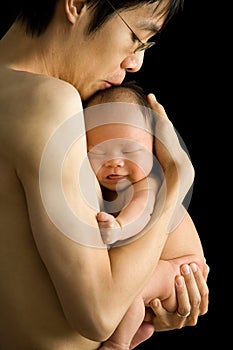 New Born Baby in Father's Arm