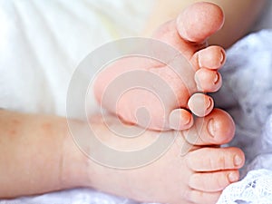 New born baby feet stock photo