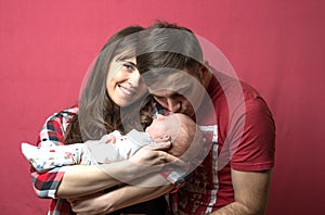 New born baby with his parents