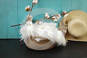 New born or baby portrait photography backdrop white fur nest, cotton flowers and blue boards background, side view