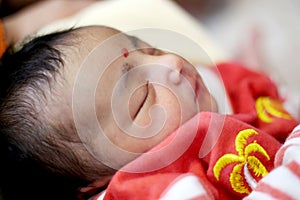 New Born Cute Baby Sleeping Portrait looking so lovely.