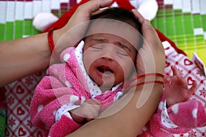 New Born Cute Baby Sleeping Portrait looking so lovely.