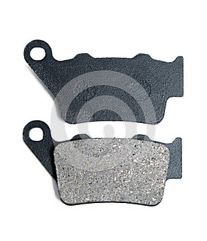 New brake pads for a motorcycle on white