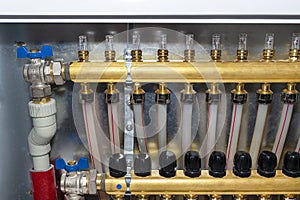 New brass manifold for underfloor heating systems with magnetic rotameters and manual knob.