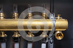 New brass manifold for underfloor heating systems with magnetic rotameters, visible termination of the circuit.