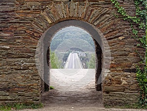 Ancient archway - Portomarin photo