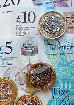 New British plastic banknotes and pound coins