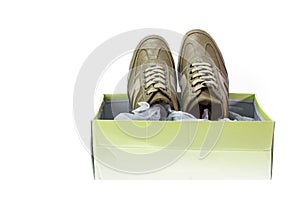 New brown shoe in box isolated on white