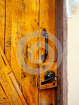 New brown wooden door in house interior