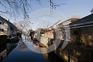 Reflections in a backwater of St Ives, Cambridgeshire, on a clear day